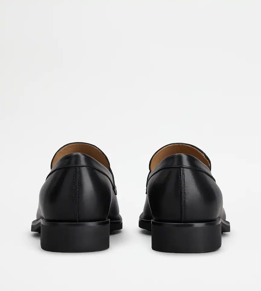 Tod's Round Toe Slip-on Loafers In Black