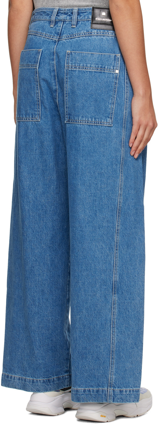 WOOYOUNGMI EMBOSSED PATCH DENIM TROUSERS