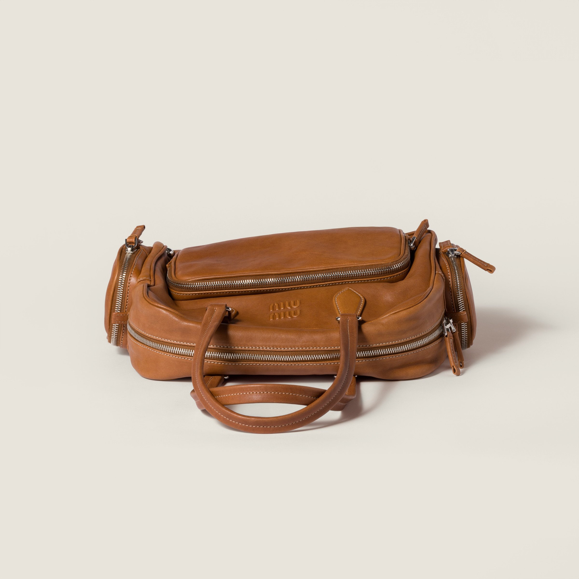 Miu Miu Pocket Nappa Leather Top-handle Bag In Brown