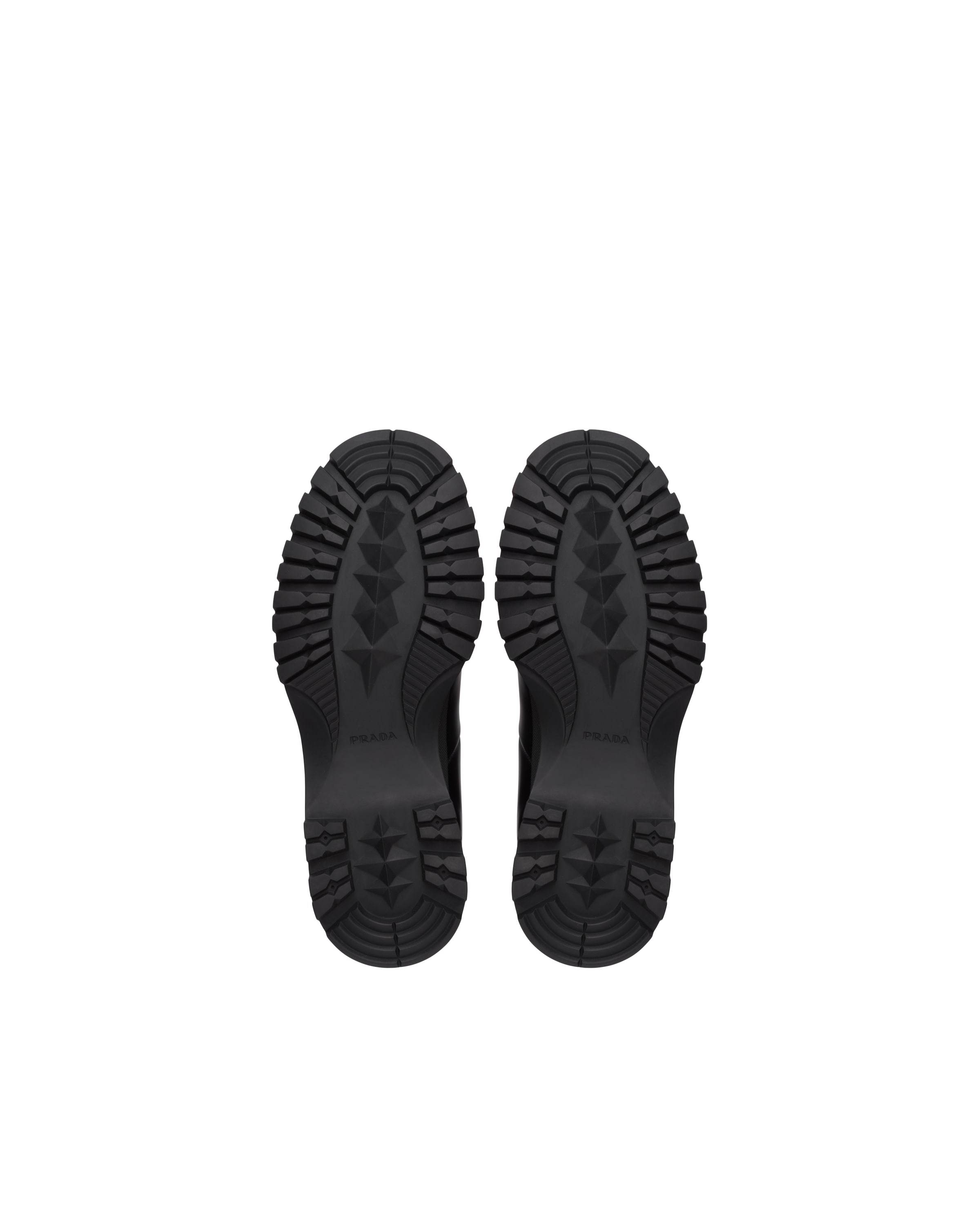 Prada Brixxen Ankle-length Boots In Black