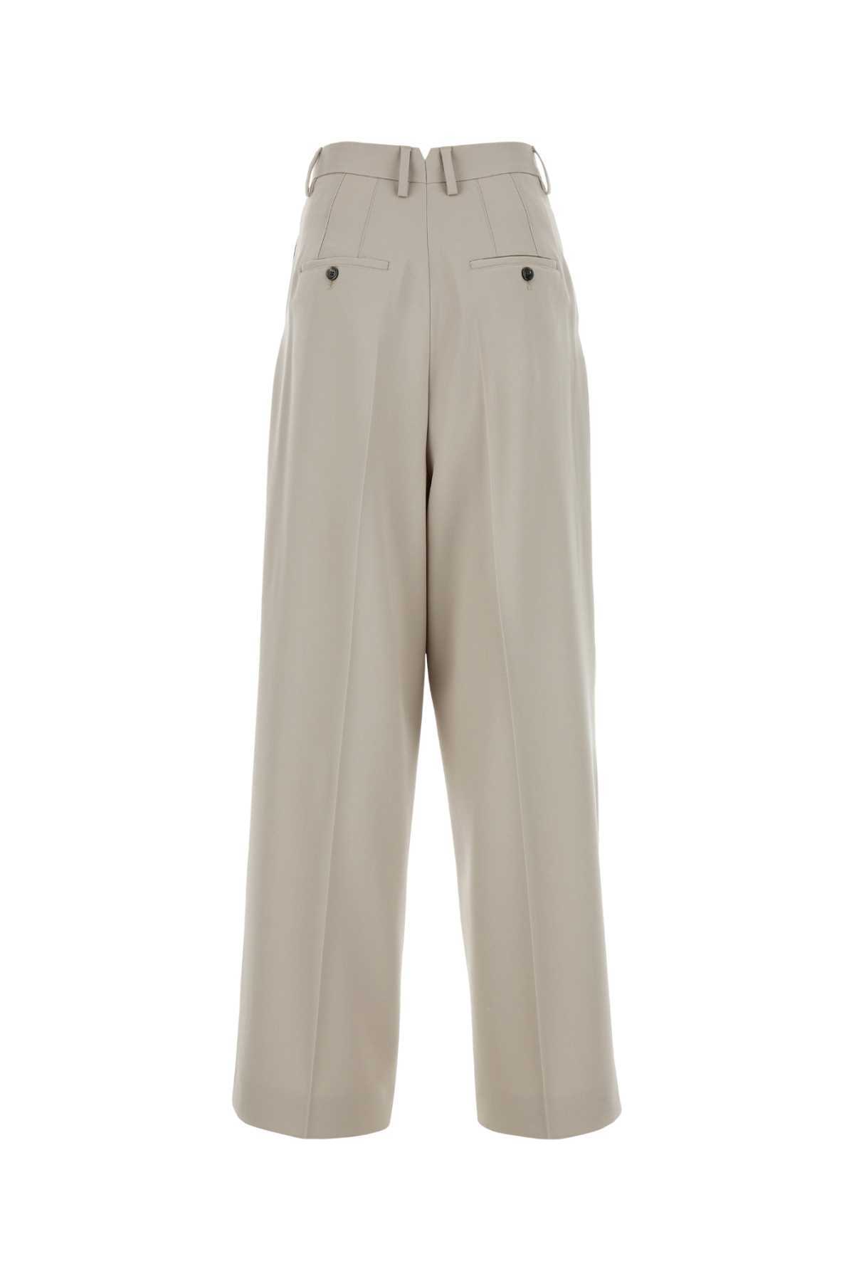 Shop Ami Alexandre Mattiussi Ami Wide-leg Pleated Pants In Nude