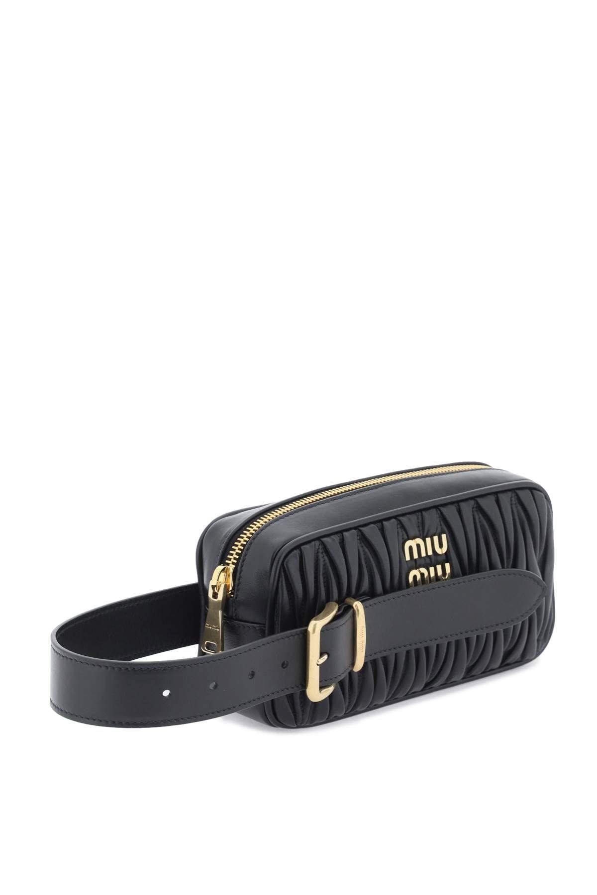 Miu Miu Woman Black Leather Clutch In Black