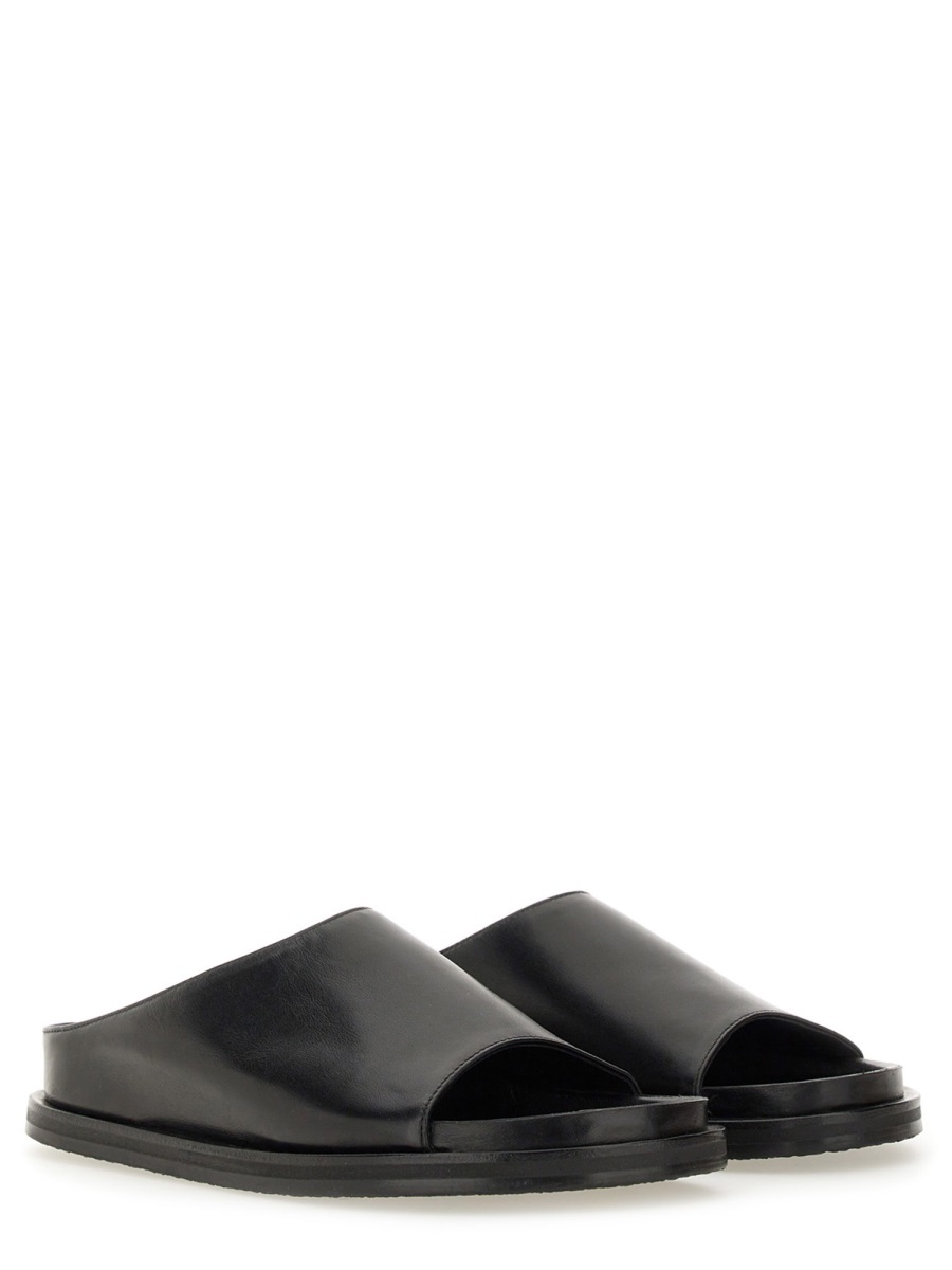 Studio Nicholson Minimalist Slide Flat Shoes In Black