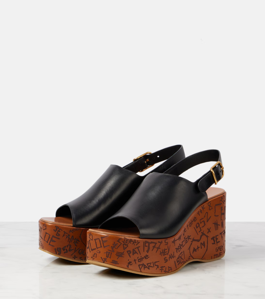 Chloé Maxime Black Wedge With Engraved Written Decorations And Logo Buckle In Leather Woman