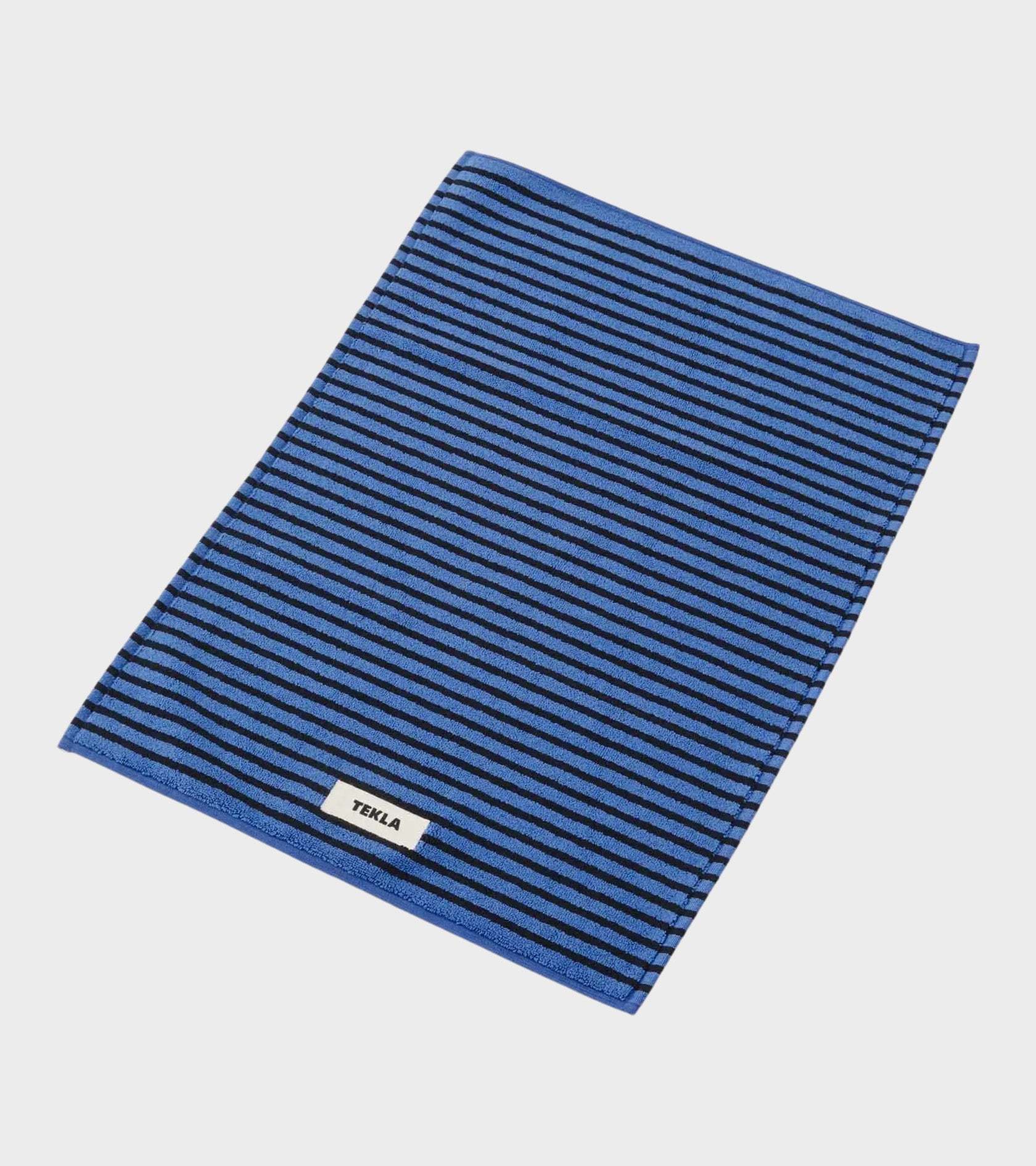 Tekla Striped Bathroom Mat In Blue