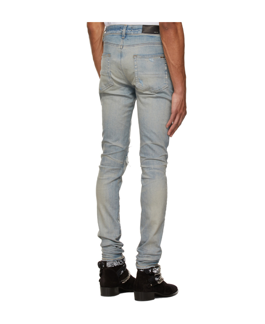 AMIRI MX1 RIPPED SKINNY JEANS