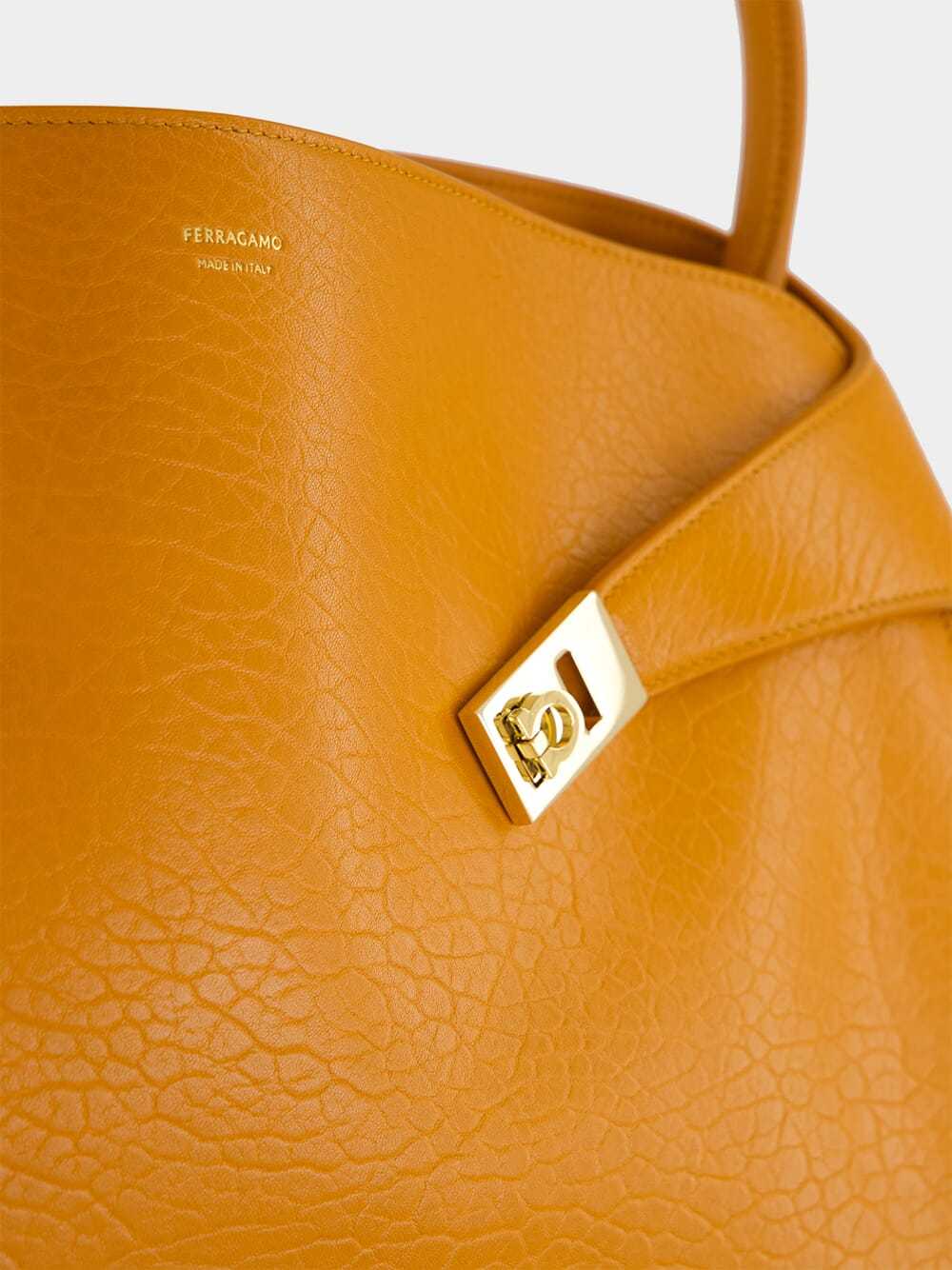 Ferragamo Medium Hug Maxi-grain Leather Shoulder Bag In Orange