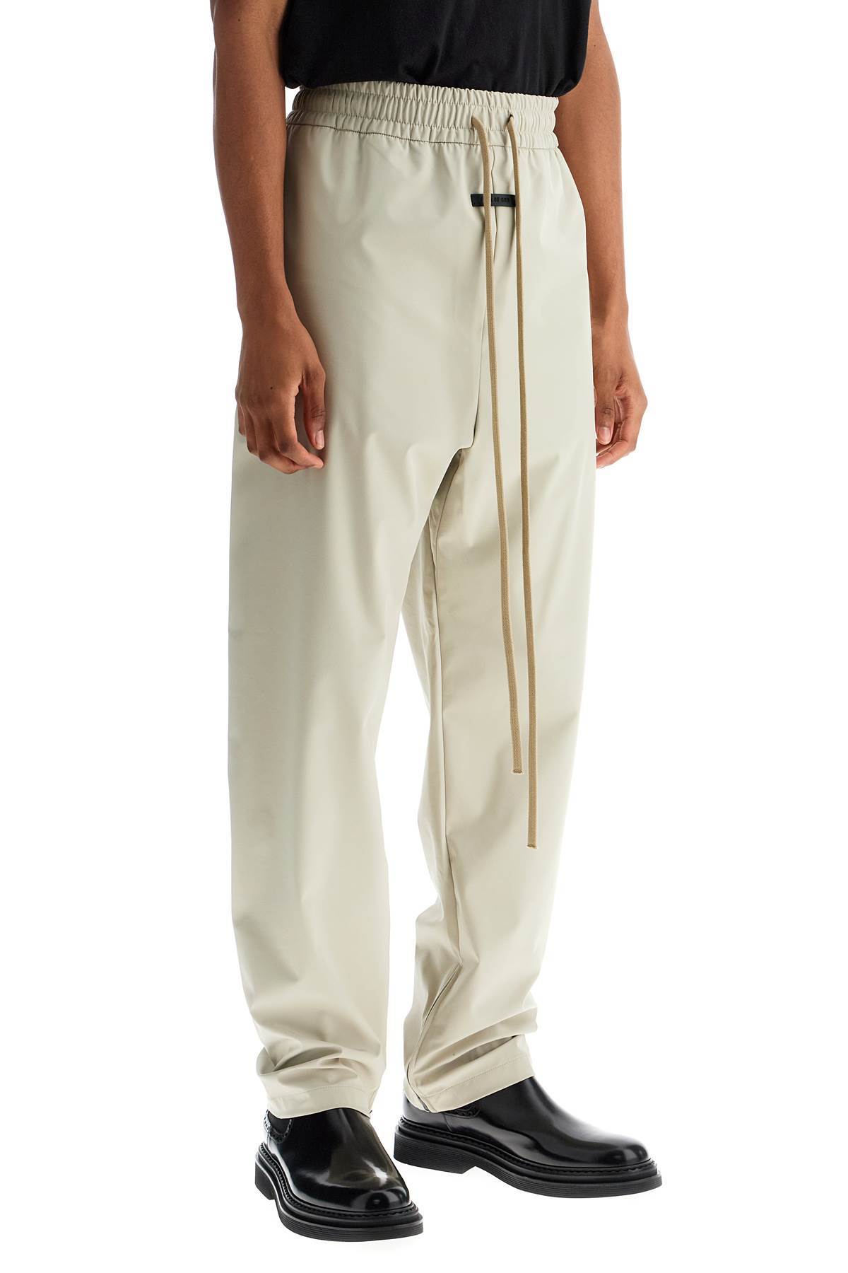 Shop Fear Of God Logo-appliqué Track Pants In White