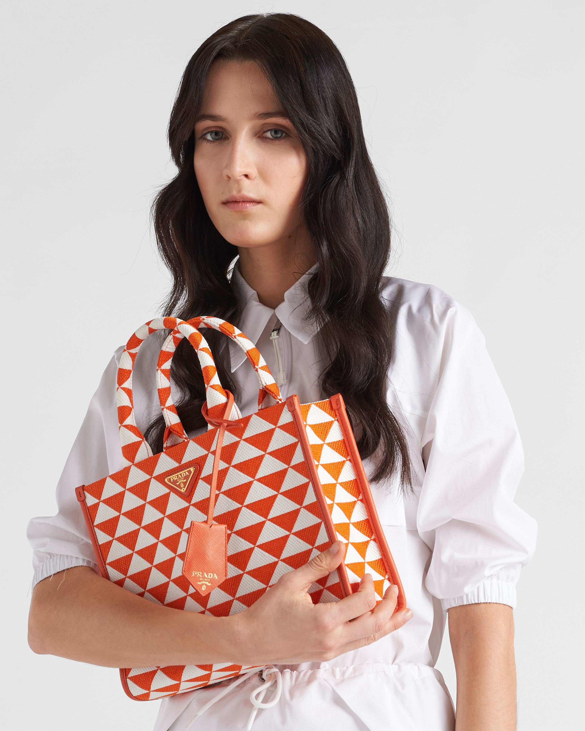 Prada Large Symbole Embroidered Fabric Handbag In Orange/white