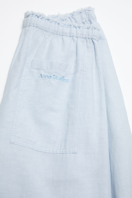 ACNE STUDIOS EMBROIDERED-LOGO WIDE-LEG TROUSERS 