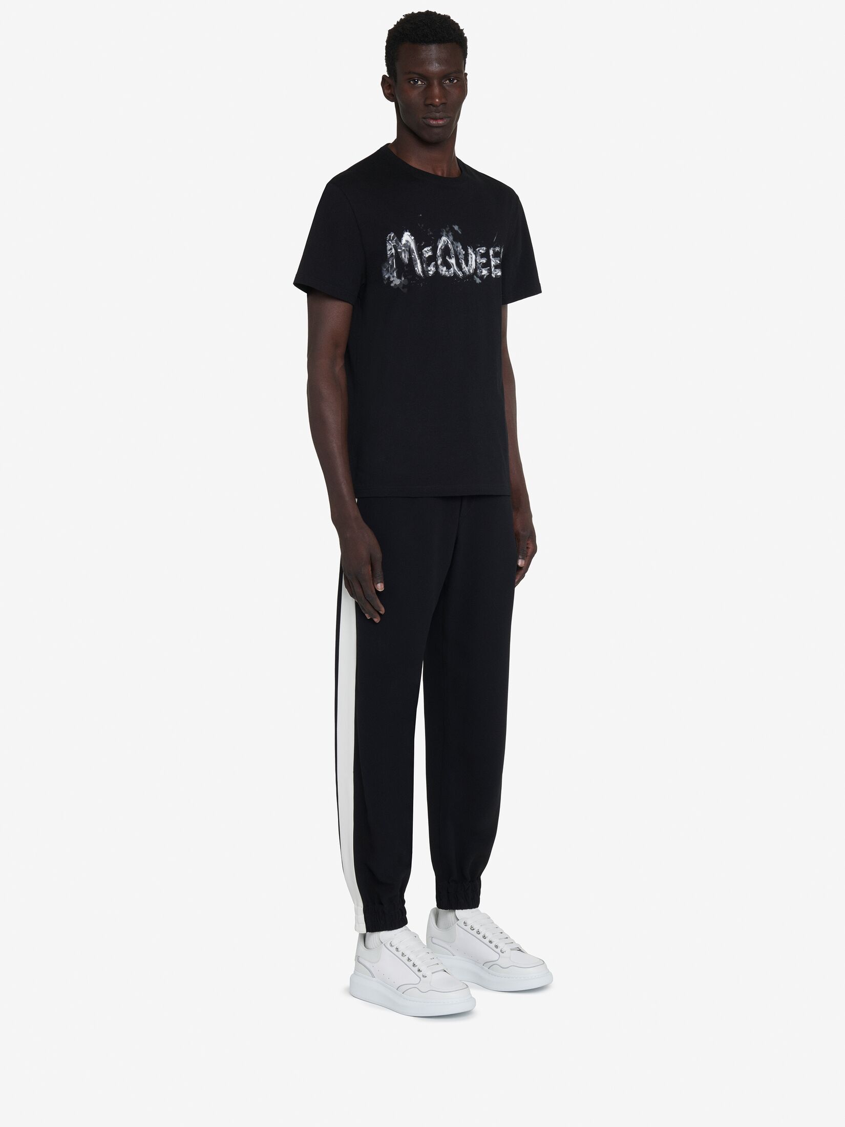 Alexander Mcqueen Black T-shirt With Graffiti Logo Print In Cotton Man In Black