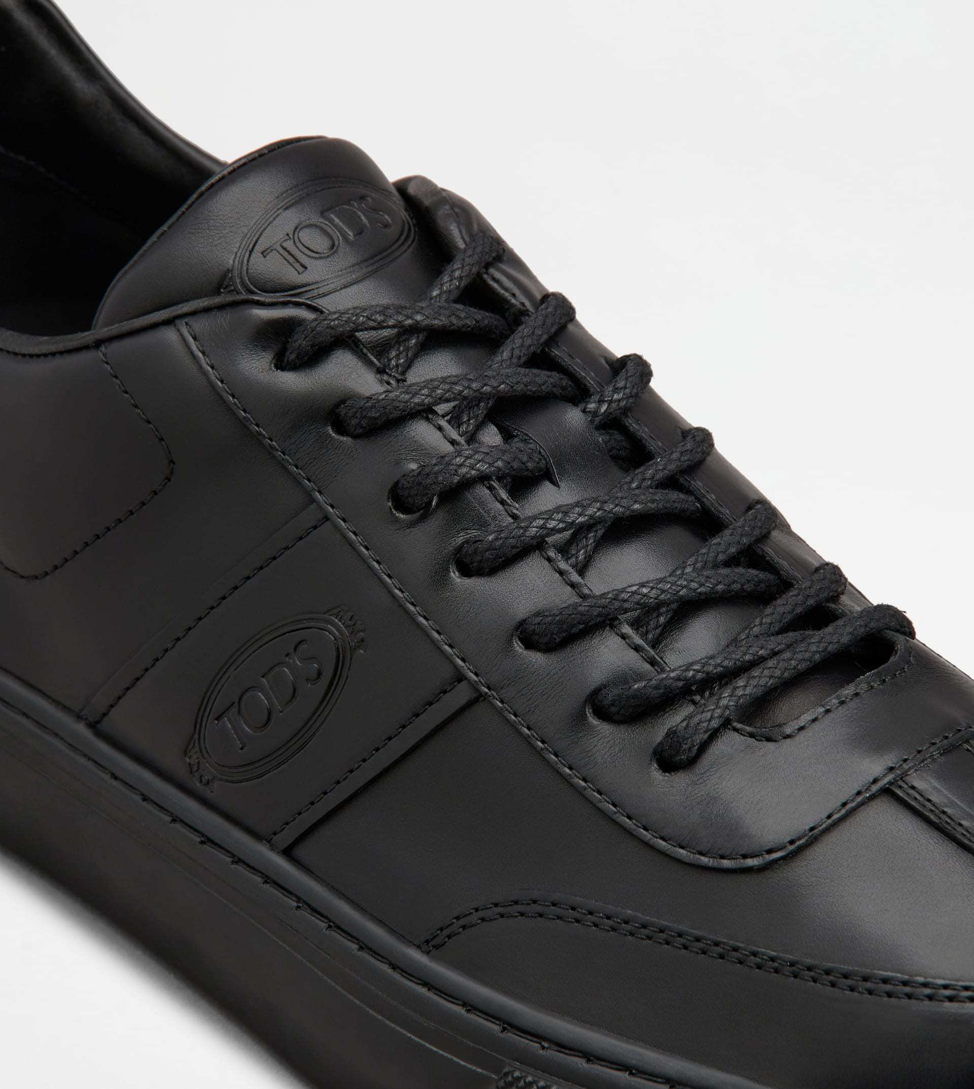 Tod's Logo-debossed Leather Sneakers In Black