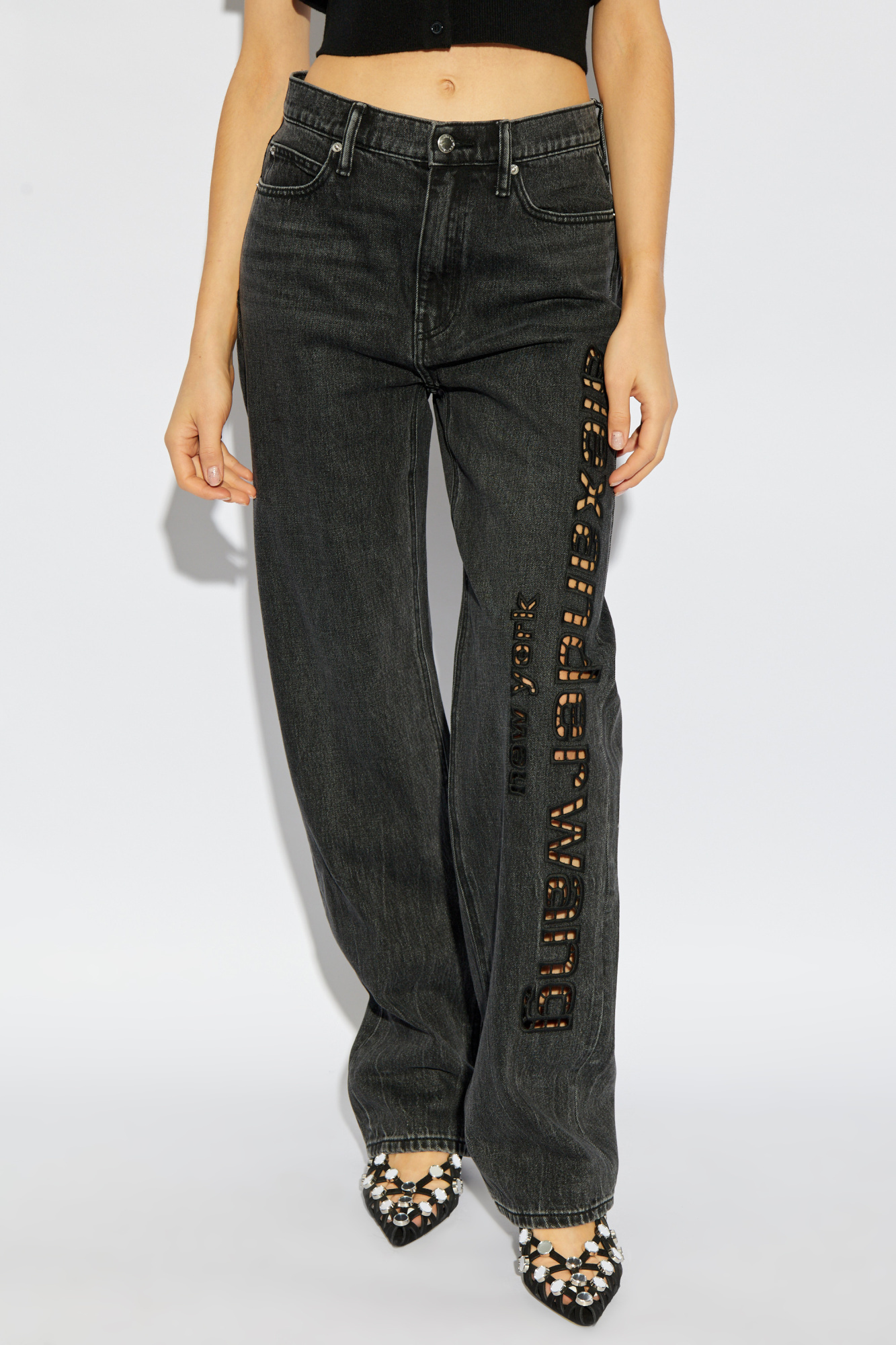 Shop Alexander Wang Cut Out-logo Jeans In Black