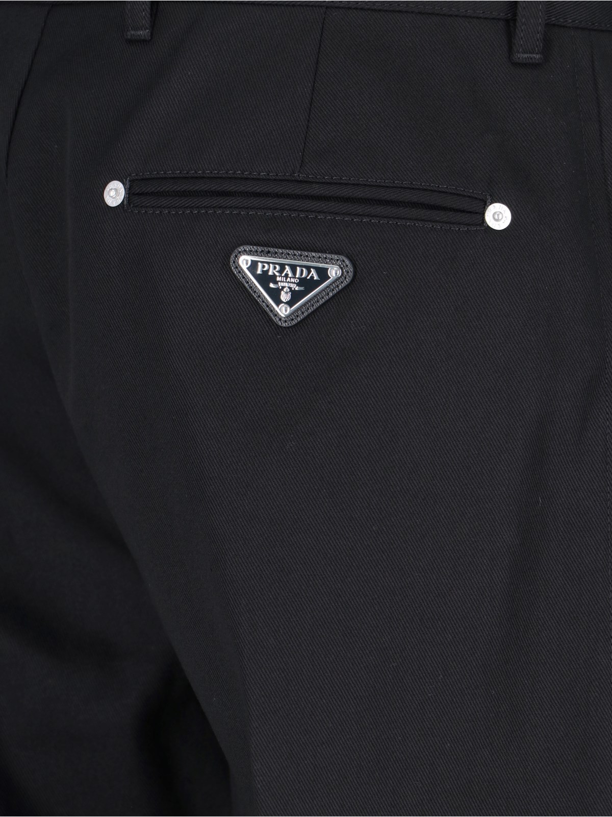 Prada Triangle-logo Tapered-leg Jeans In Black