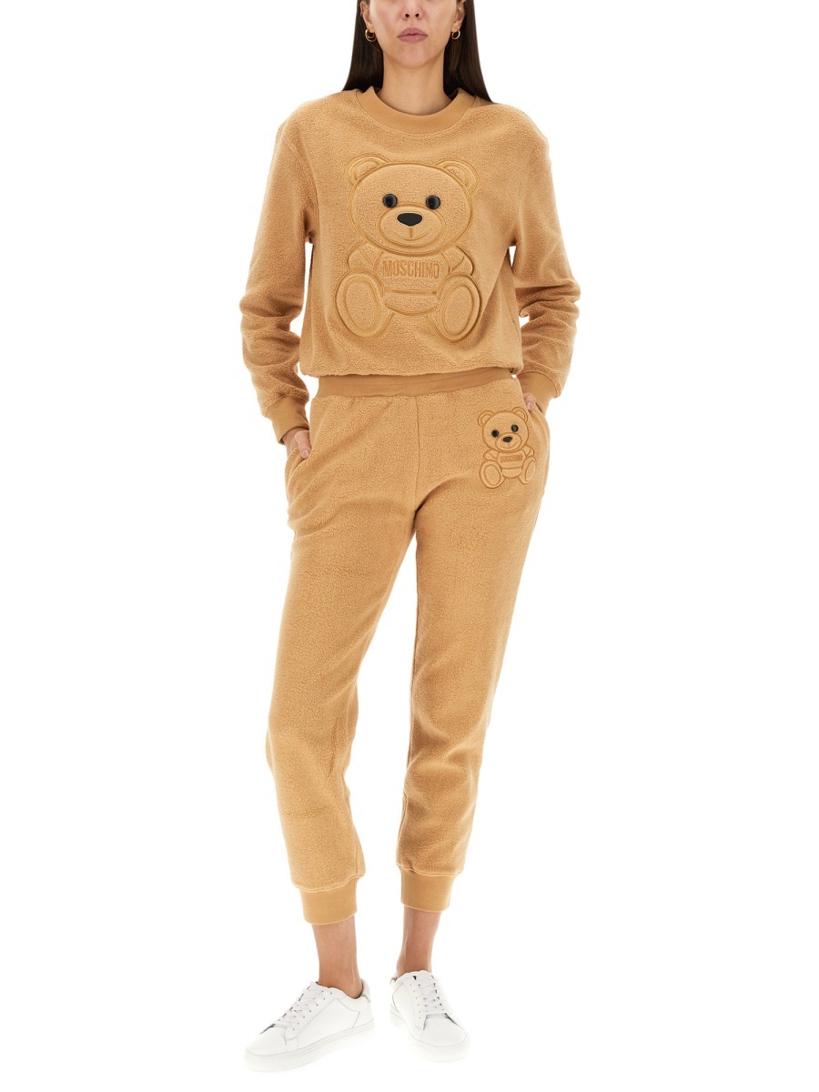 Moschino Teddy-bear Detail Cropped Trousers In Nude