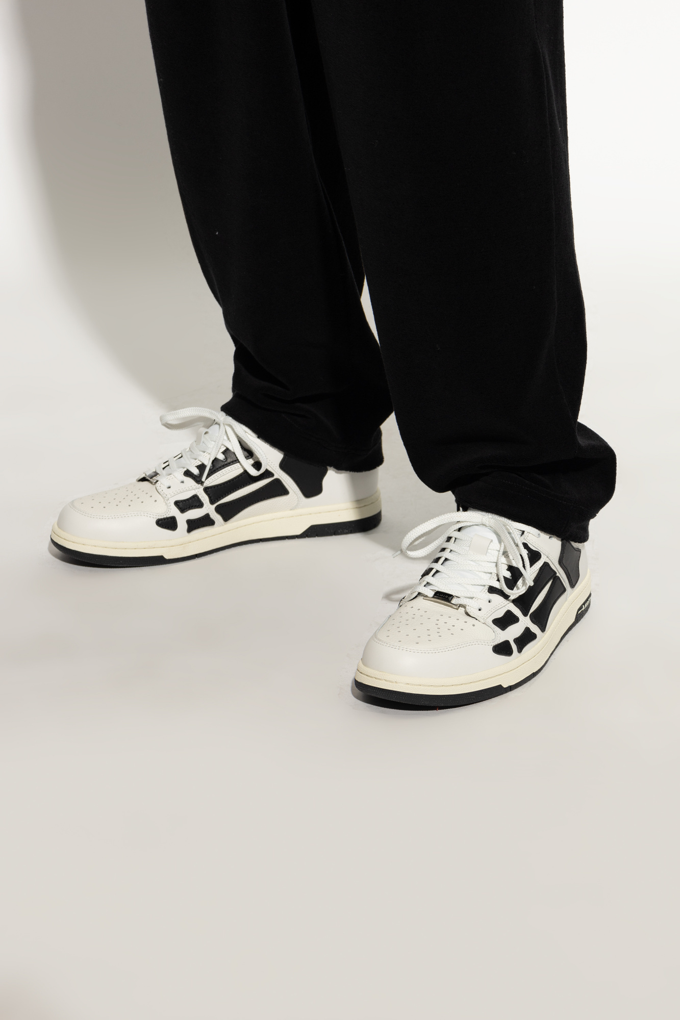 Shop Amiri Skel Top Low Sneakers In White