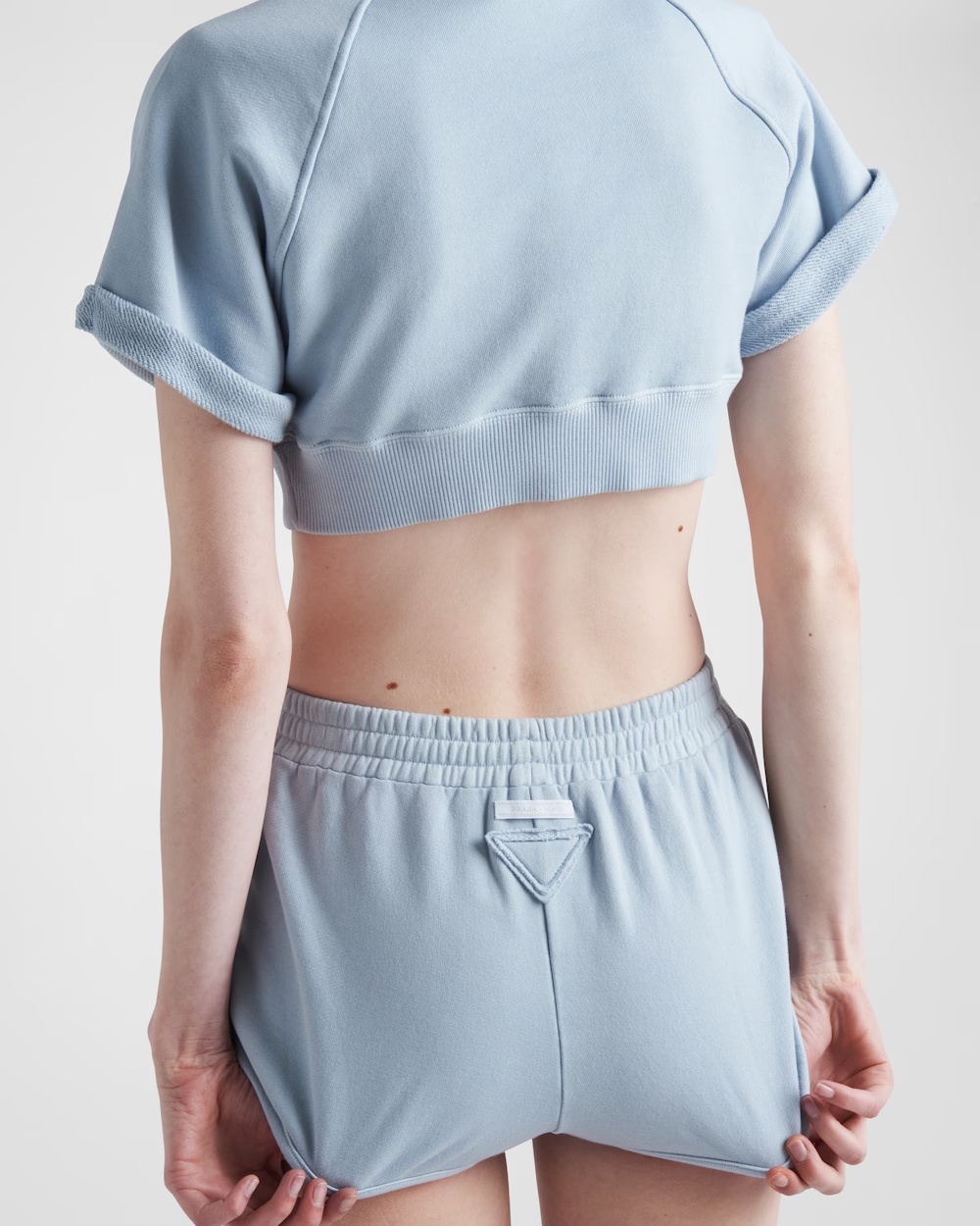 Prada Triangle-patch Jersey Mini Shorts In Interstellar Blue