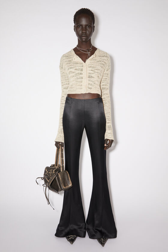 Acne Studios Low-rise Flared Trousers In Black