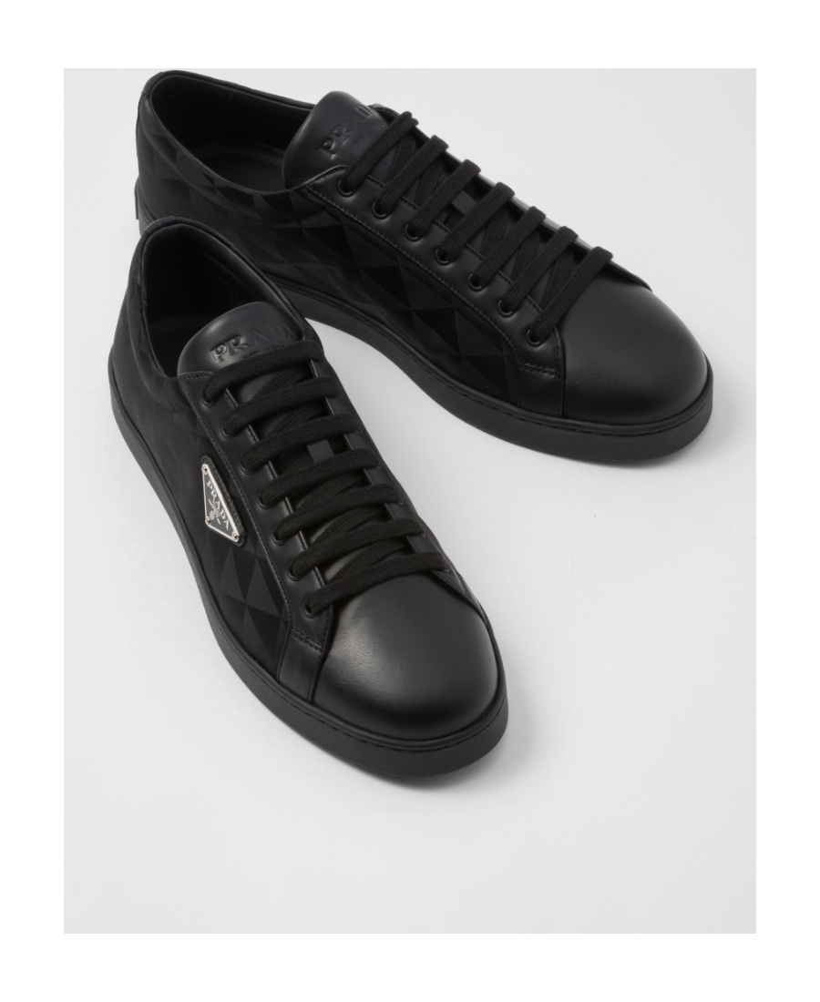 Shop Prada Leather And Nylon Sneakers In Black