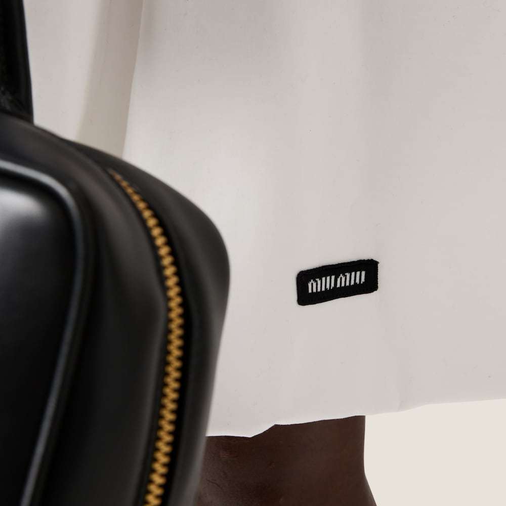 MIU MIU POPLIN AND JERSEY PRINTED SKIRT