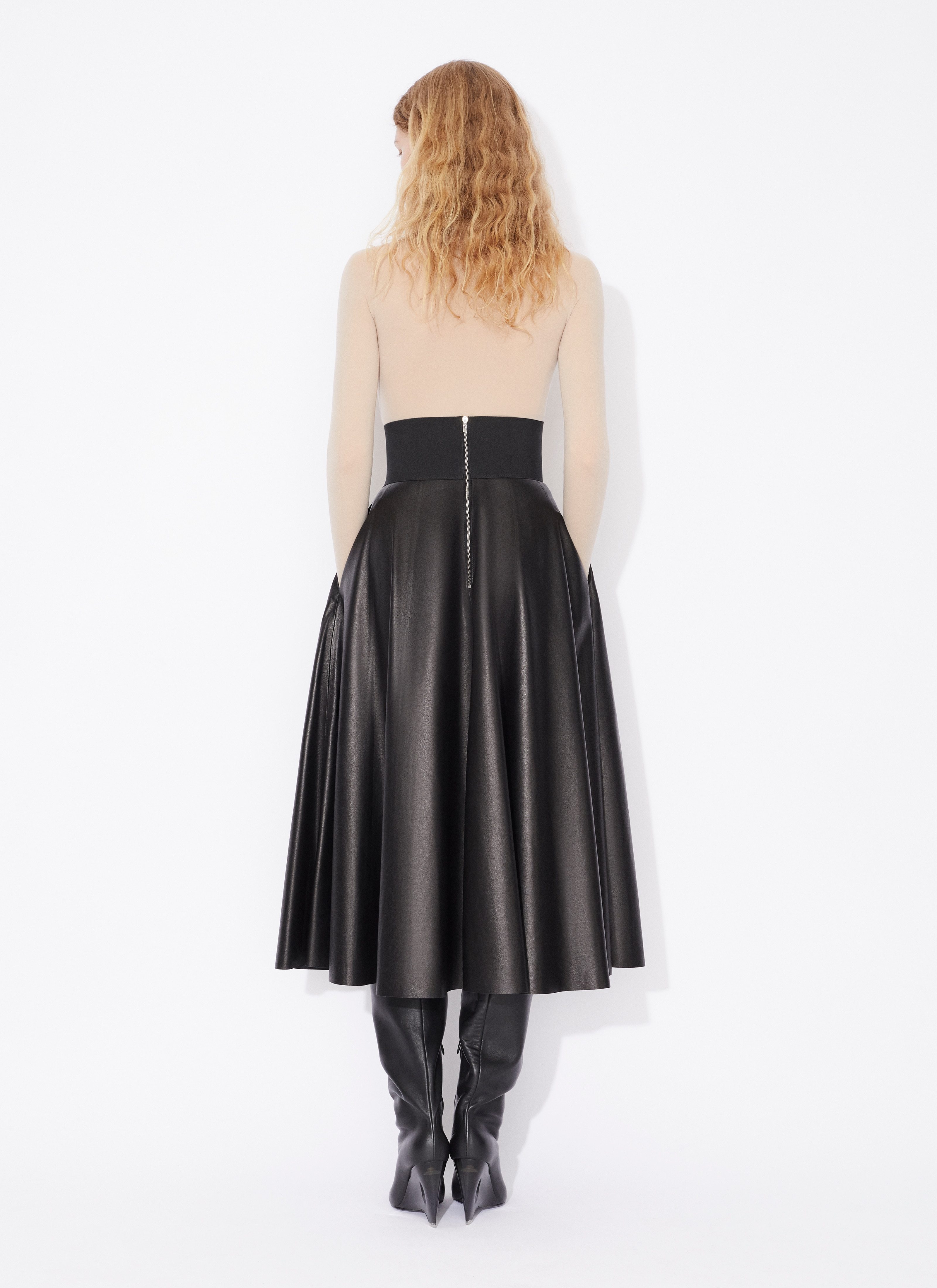Alaïa Long-sleeved Jumpsuit In Nude