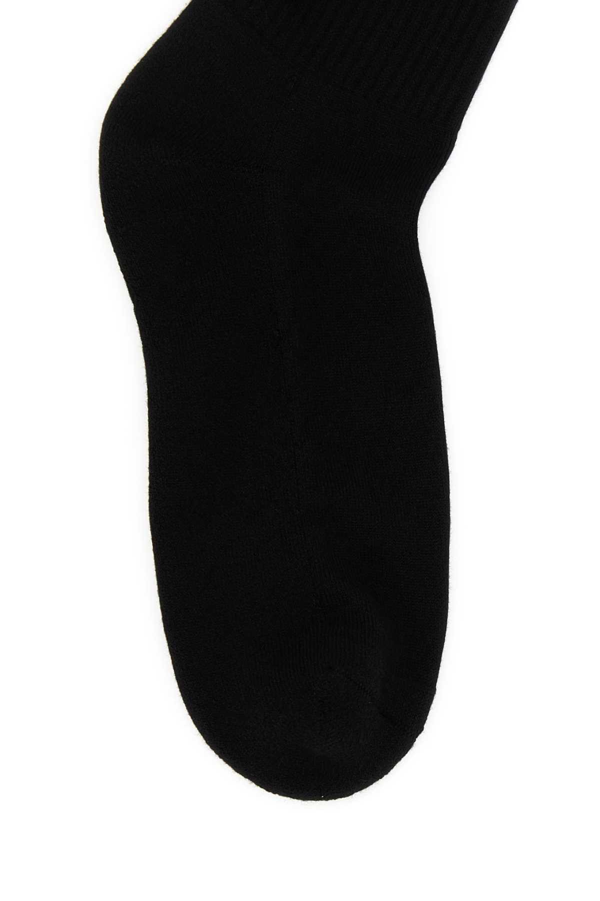 Versace Logo Inlaid Knitted Socks In Black