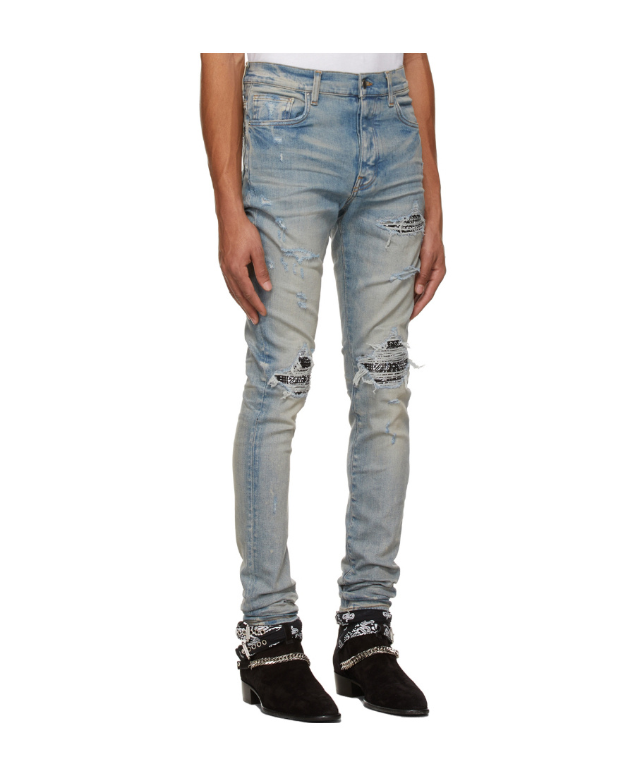 AMIRI MX1 RIPPED SKINNY JEANS