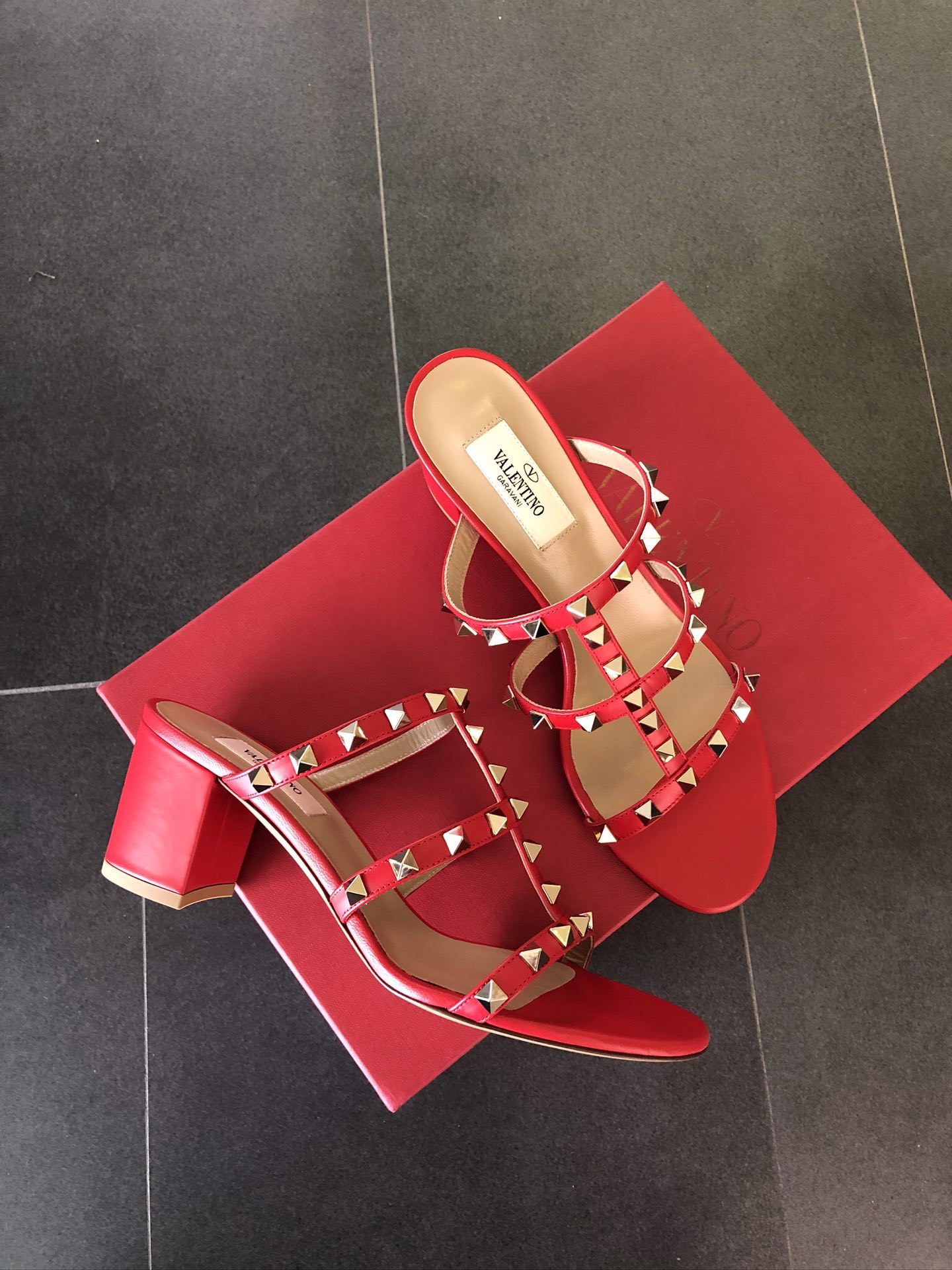 Shop Valentino Rockstud Sandals In Red