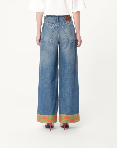 Valentino Garavani Light Blue Jeans With Logo Patch On The Back And Jacquard Cuffs In Denim Woman In Blue