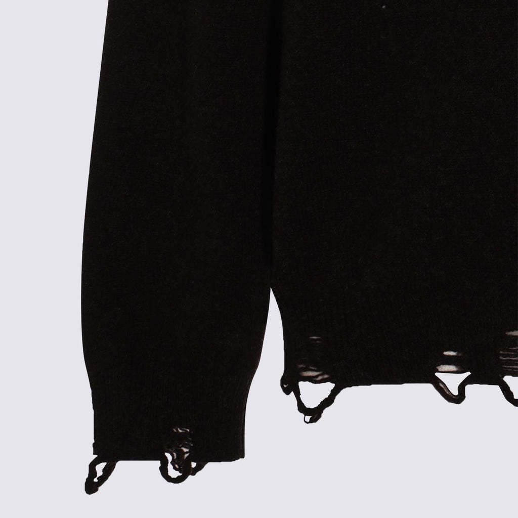 Moschino Distressed Ribbed Sweater With Cuffs And Hem In Black