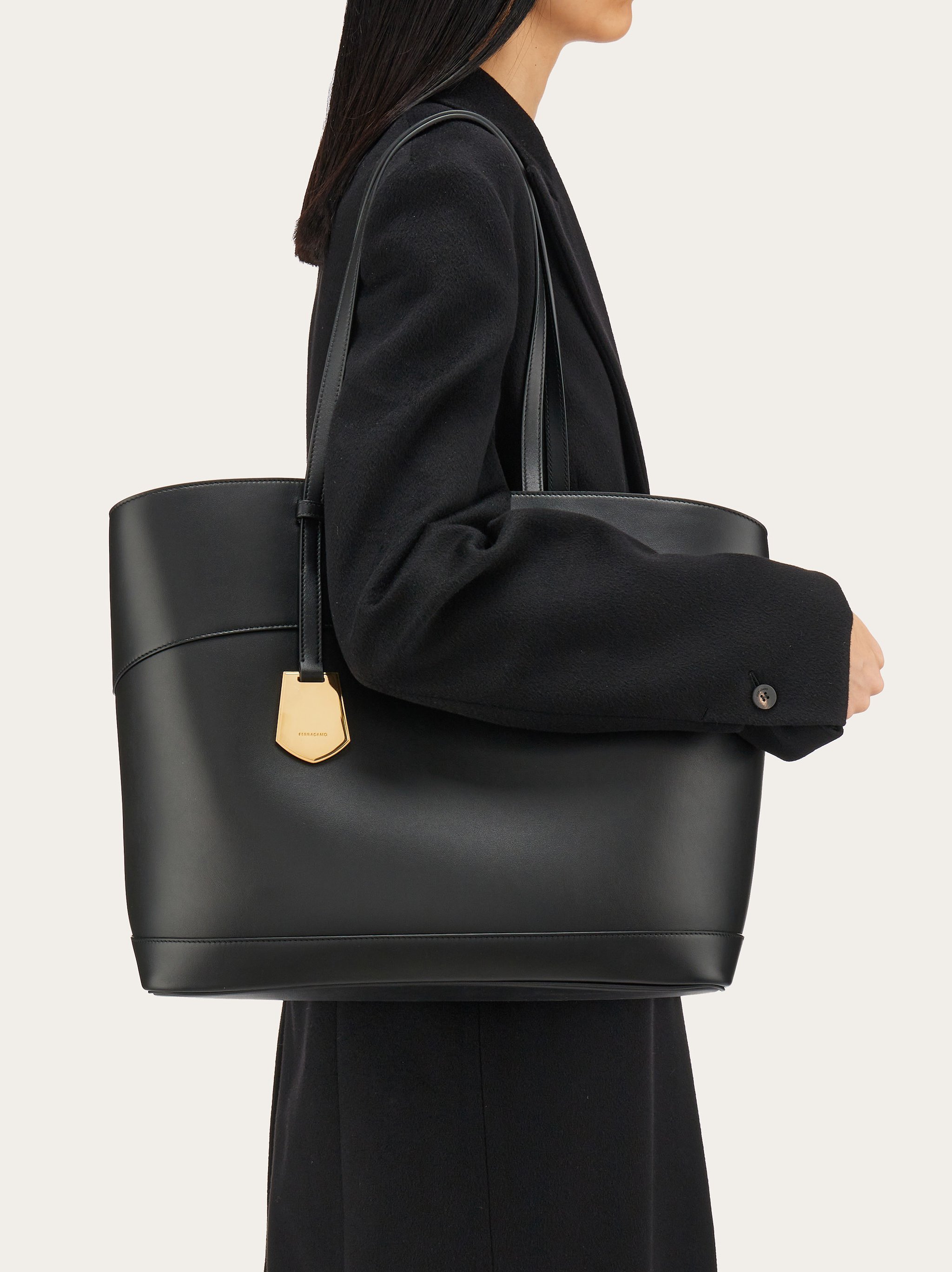 Ferragamo Salvatore Charming Logo Printed Top Handle Bag In Black