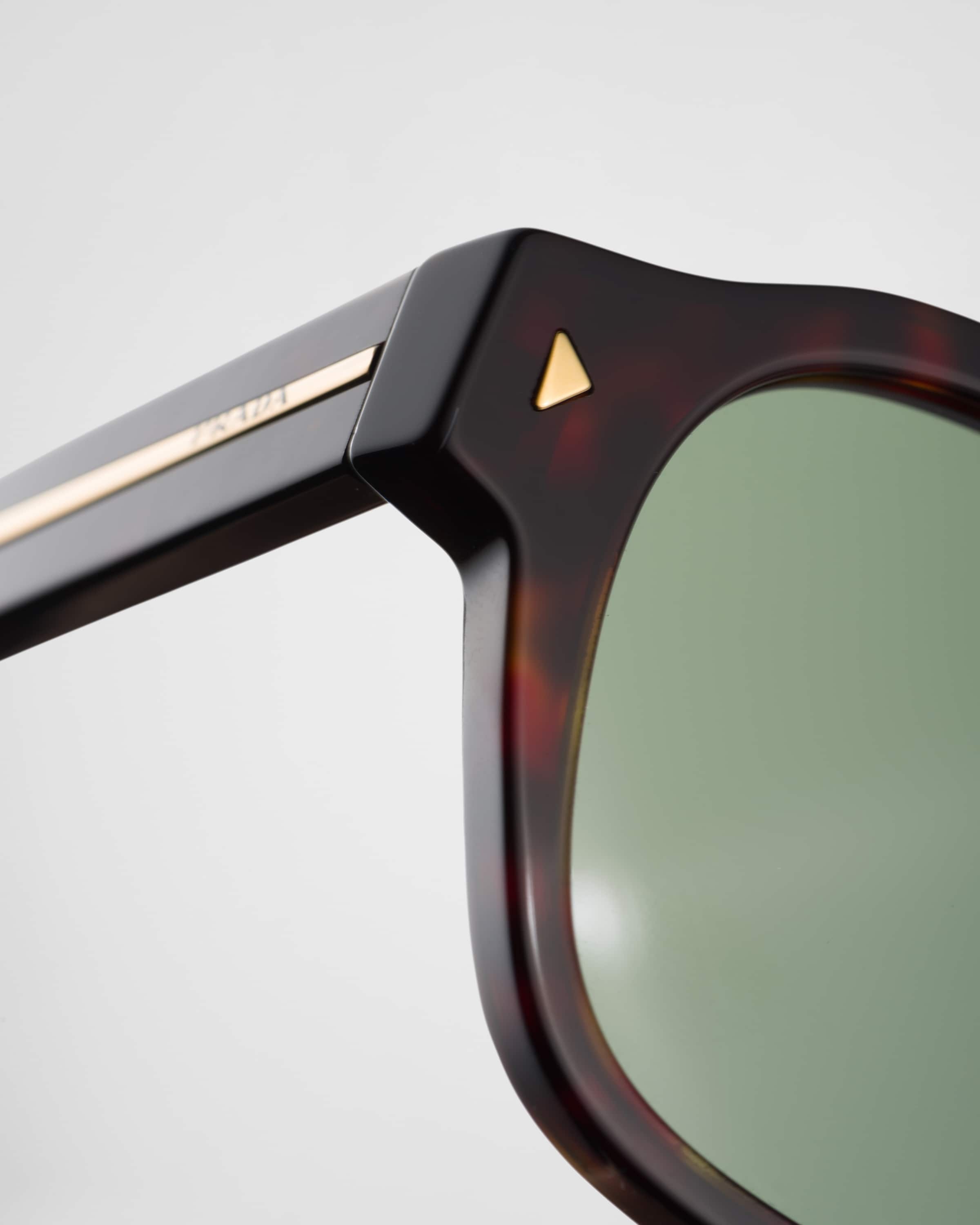 Prada Logo-engraved Sunglasses In Green