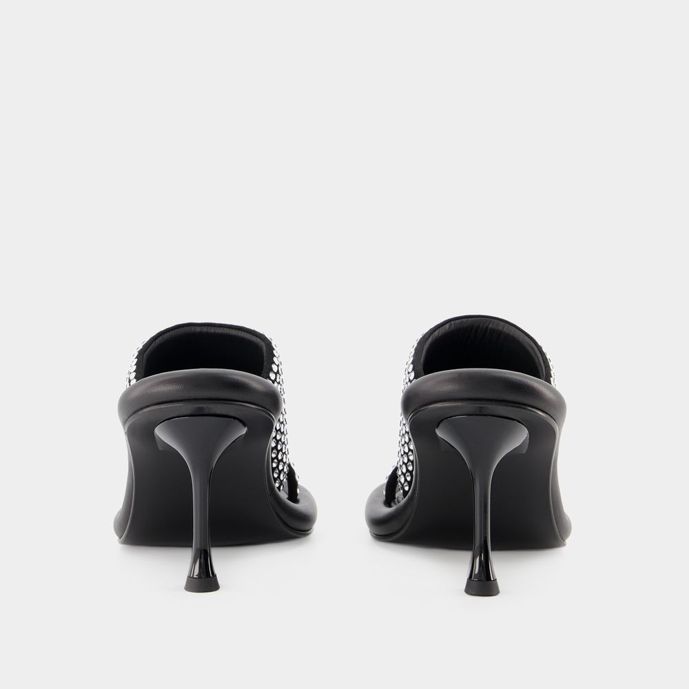 Jw Anderson Bumper-tube Leather Mules In Black