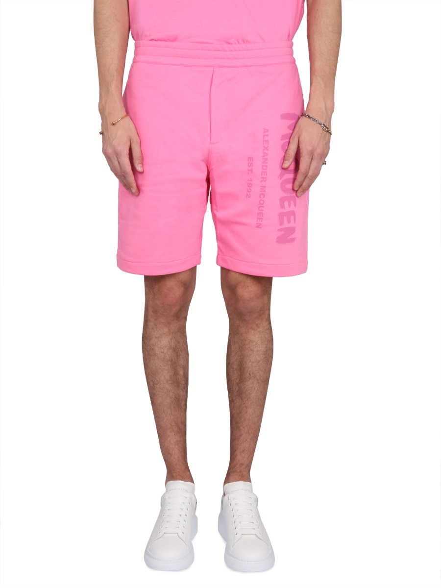 Alexander Mcqueen Men Bermuda Shorts With Graffiti Logo Print In Pink