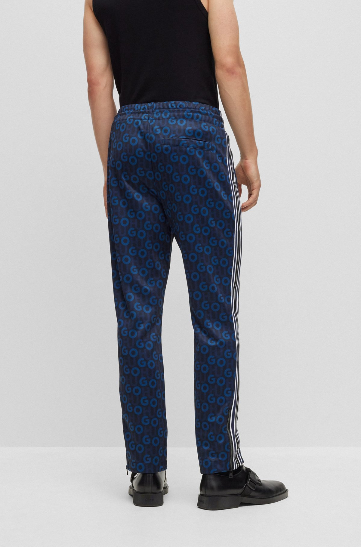 Hugo Boss Monogram-print Side-stripe Track Pants In Black