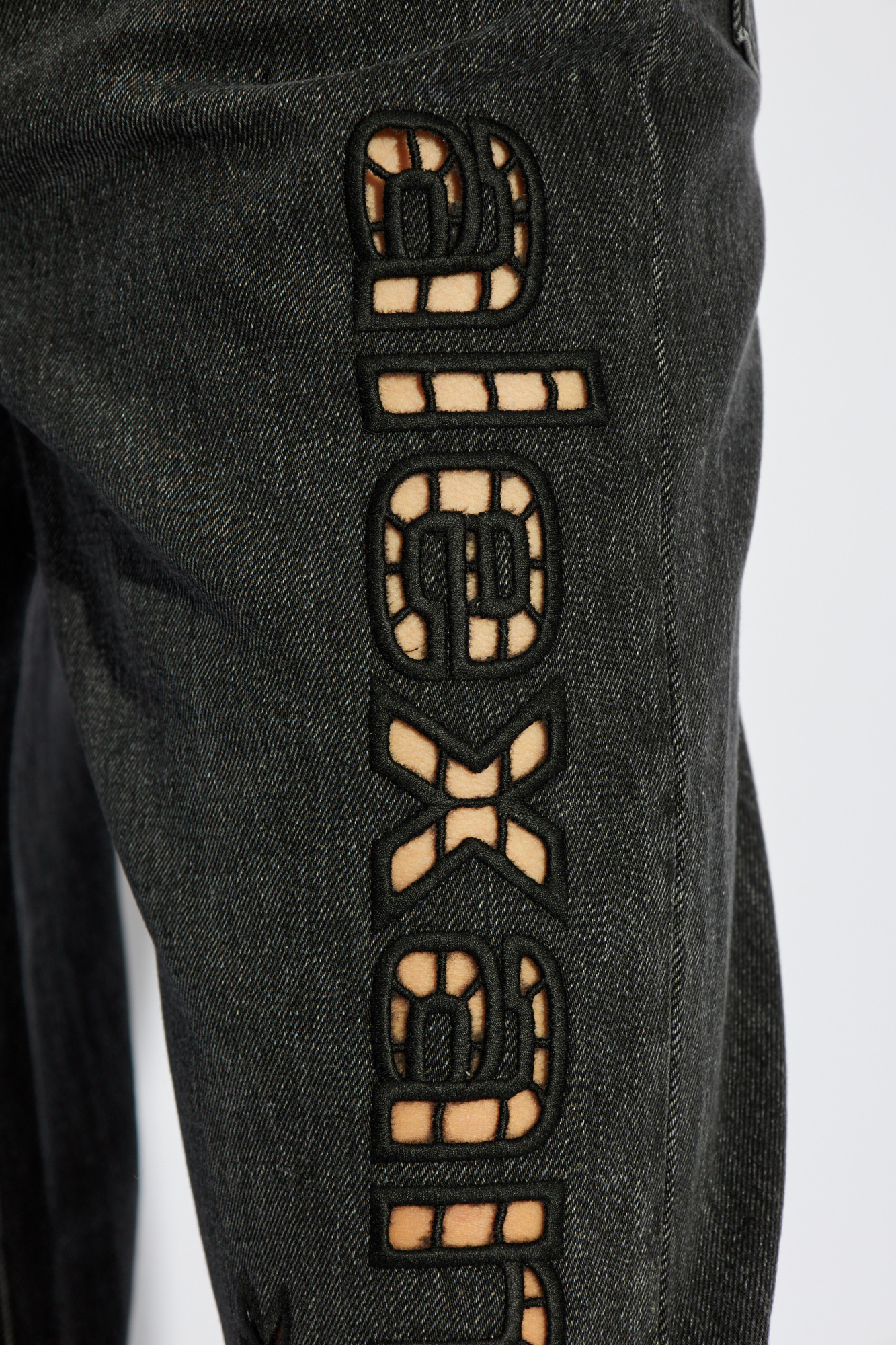 Shop Alexander Wang Cut Out-logo Jeans In Black