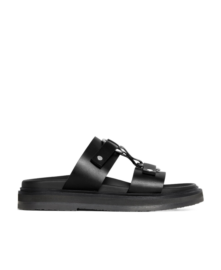 Celine Tippi-vegetable Tanned Slippers In Black
