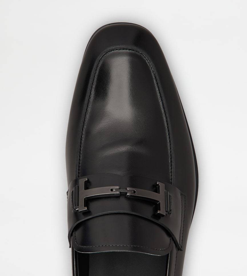 Tod's Loafers In Leather In Black