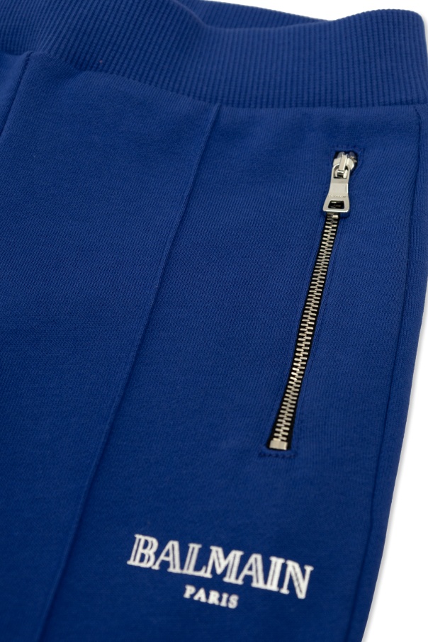 BALMAIN LOGO-PRINT FLARED TACK PANTS 