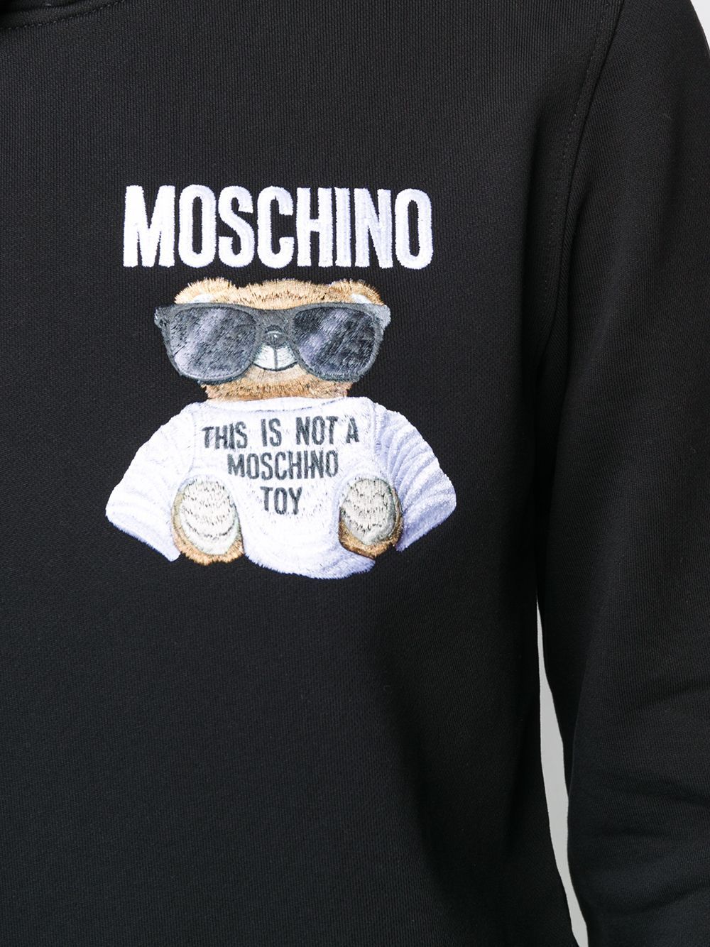 Moschino Emblem Printed Sweater In Black