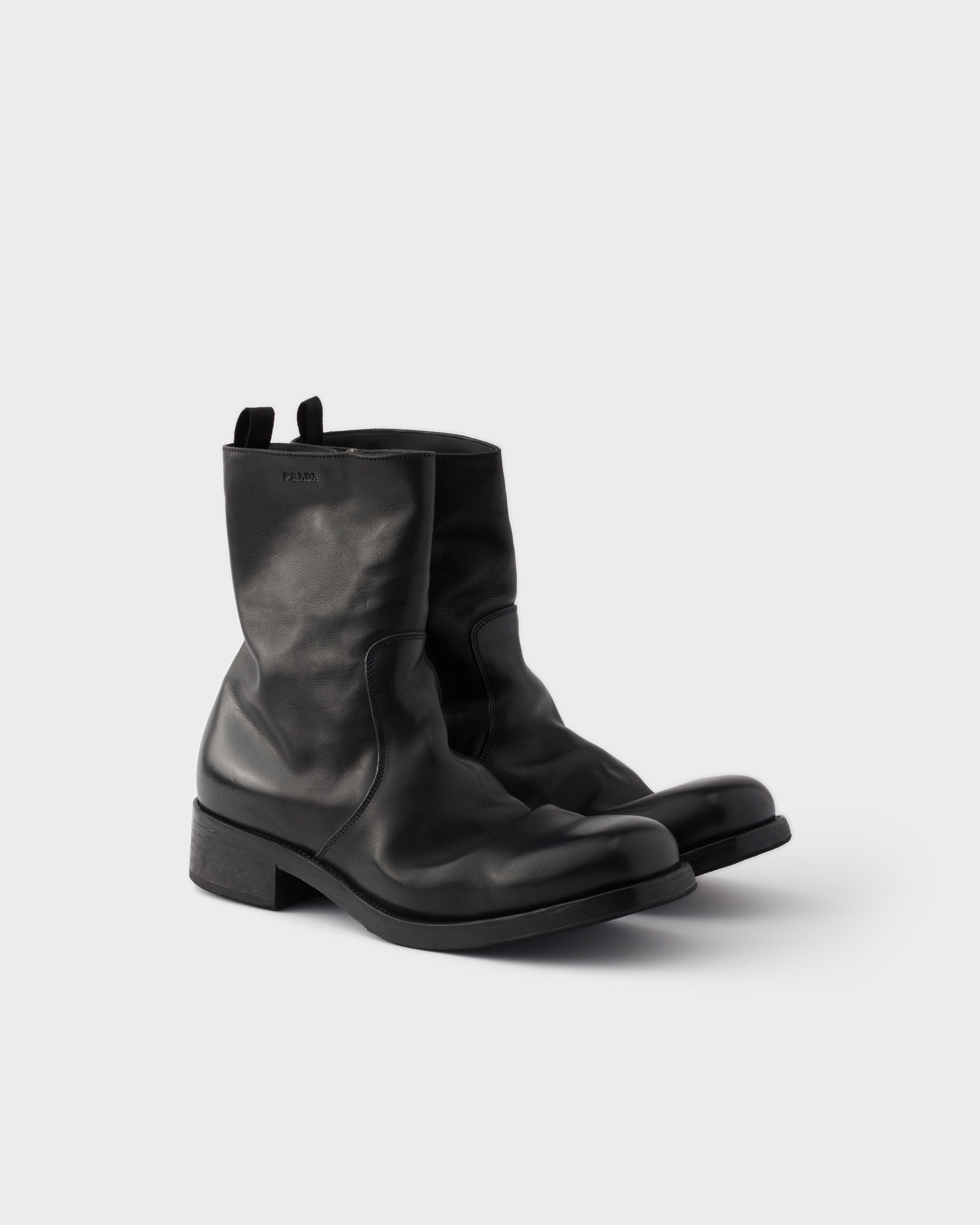 Prada Round Toe Leather Ankle Boots With Block Heel In Black