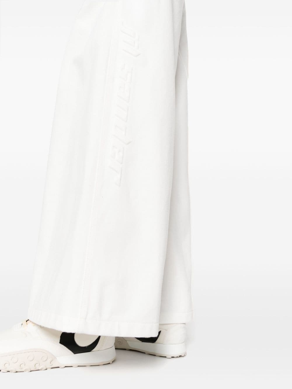 Jil Sander High Waist Flared Cut Jeans In White