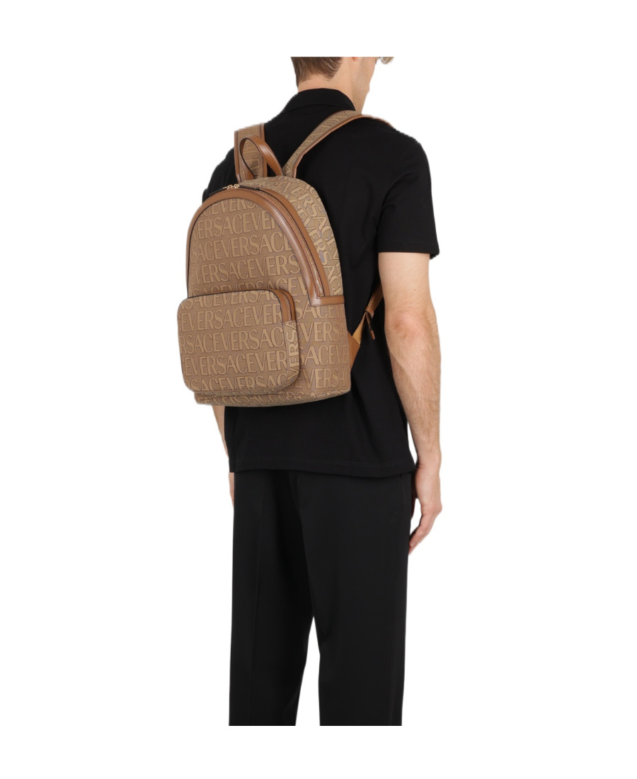 Versace All-over Logo Backpack In Beige