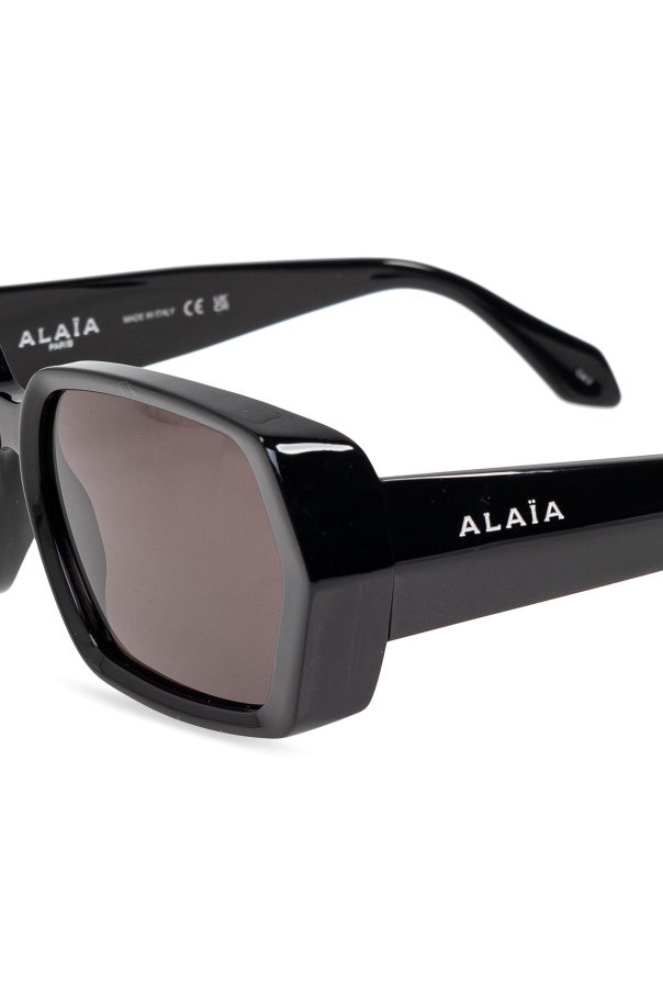 Alaïa Logo Lettering Geometric Frame Sunglasses In Gray