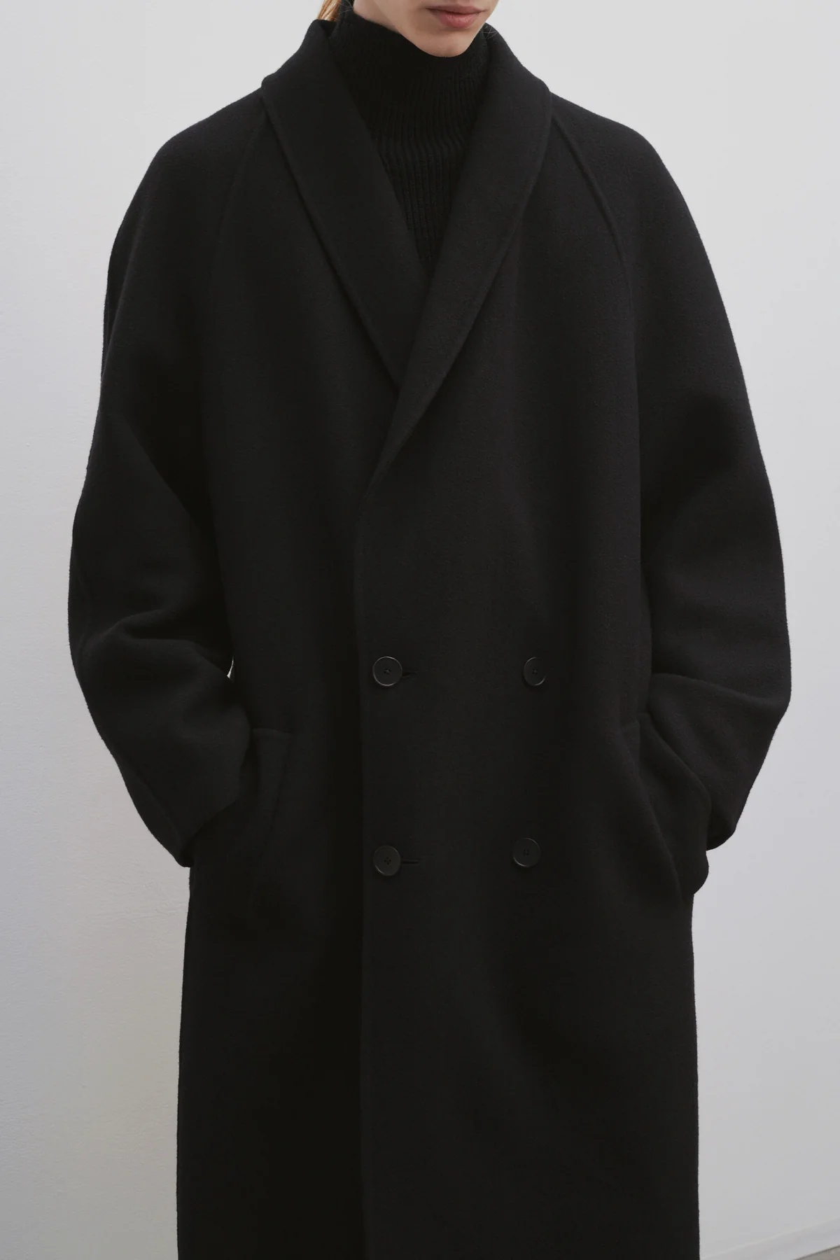 The Row Double-breasted Wool Coat In Black