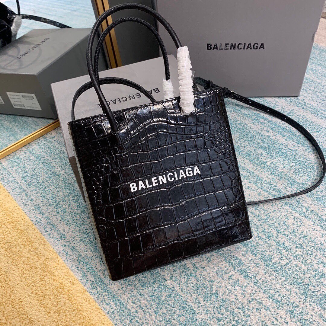 Balenciaga Xxs Shopping Embossed Emblem Handbag In Black