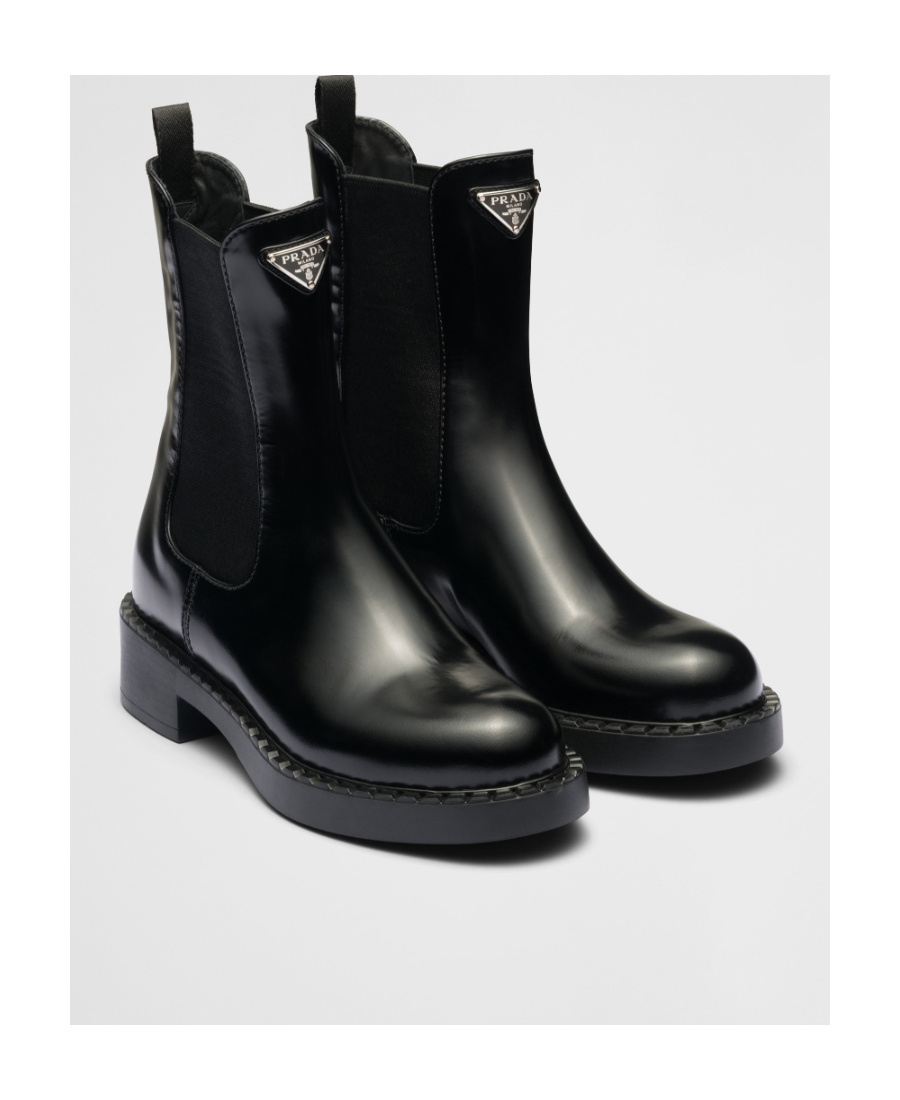 Prada Logo Plaque Brushed-effect Ankle Boots In Black