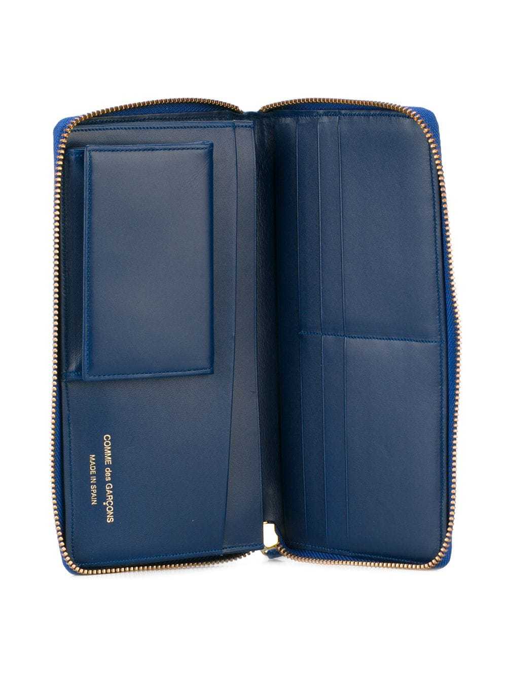 COMME DES GARÇONS EMBOSSED WALLET