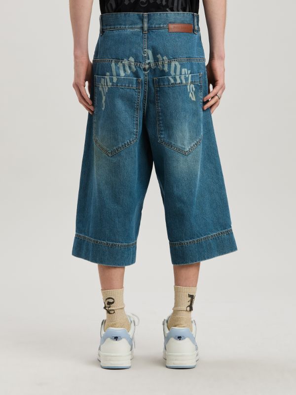 Palm Angels Lasered Curved Logo Denim Skater Bermuda In Blue