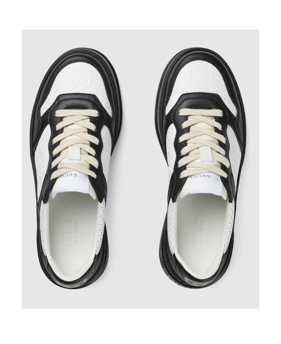 Gucci Gg Embossed Low-top Sneakers In Black